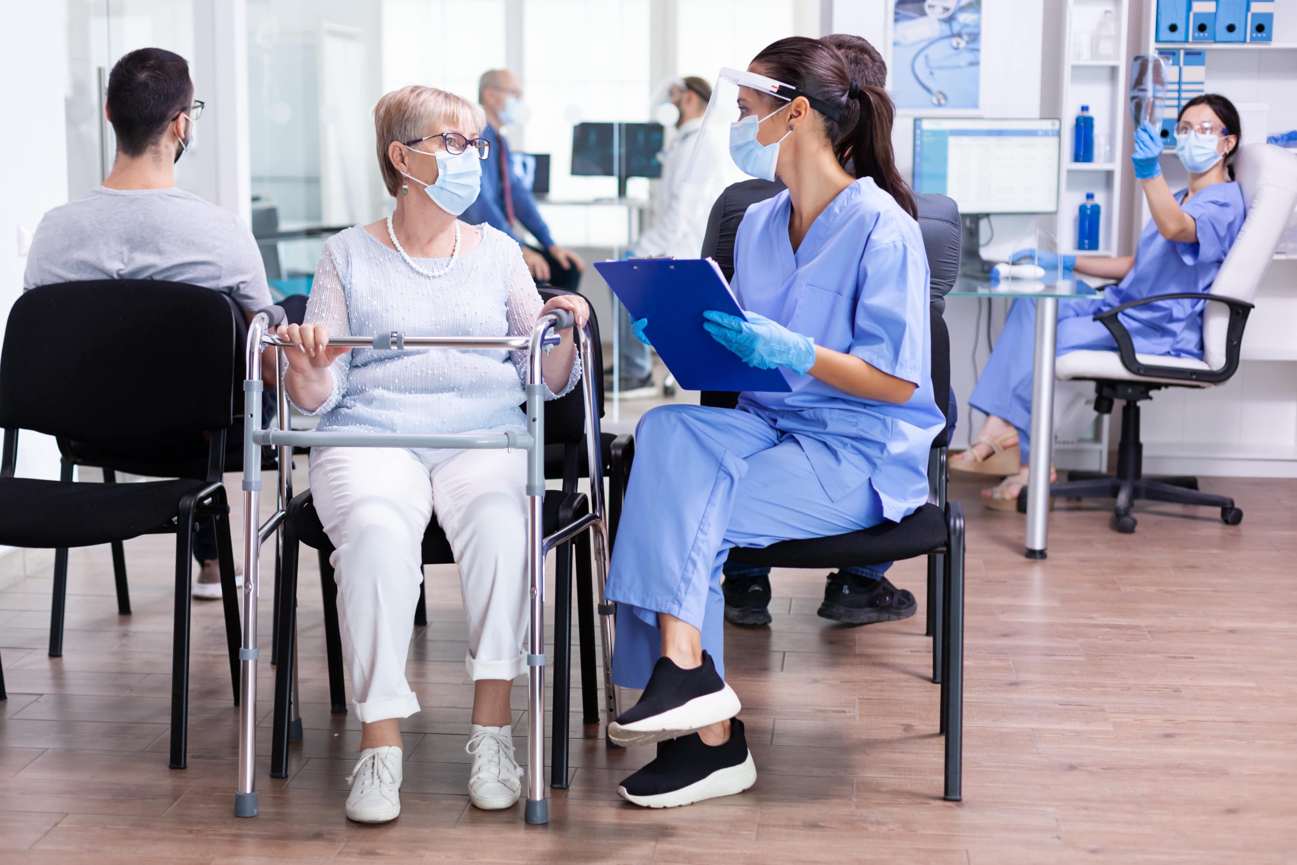 handicapped-senior-woman-with-walking-min